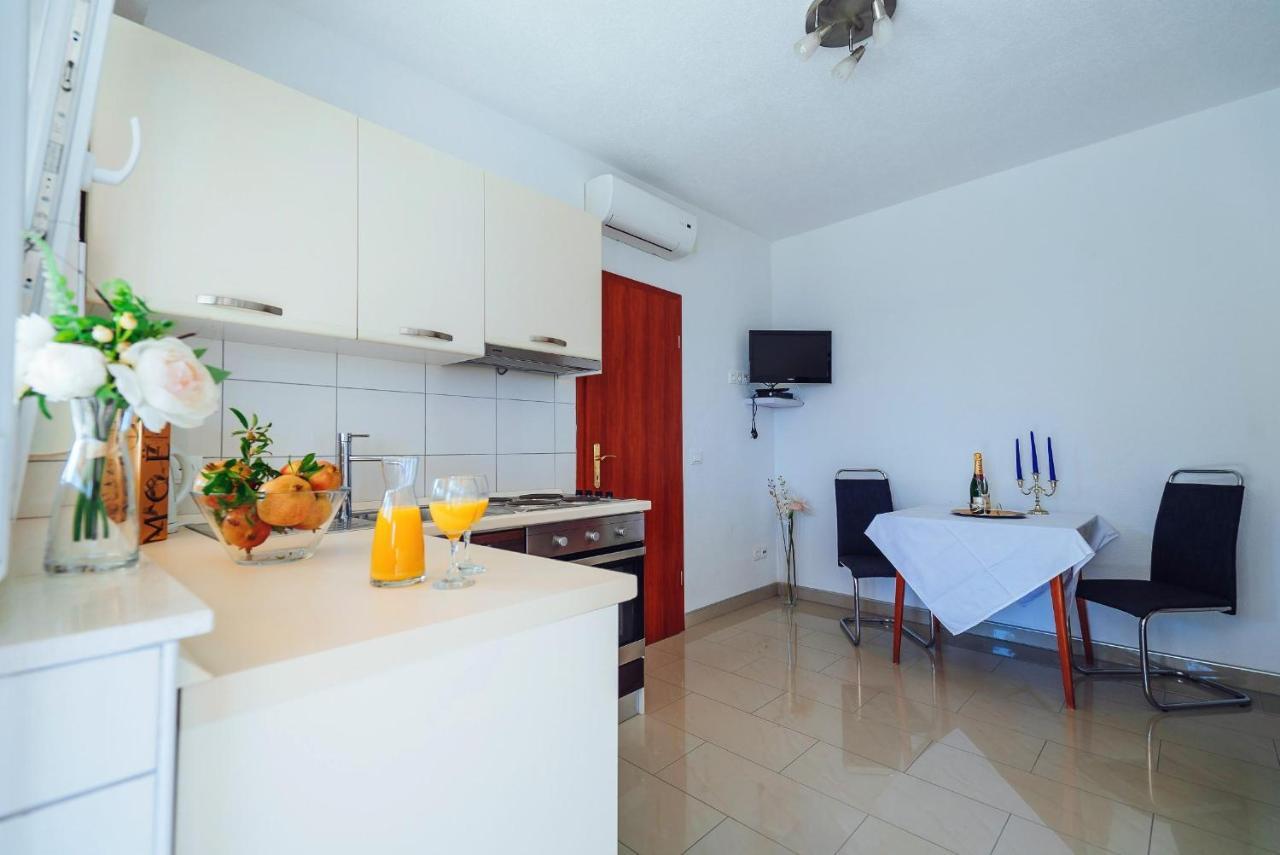 Apartmani Simundic โตรกีร์ ภายนอก รูปภาพ